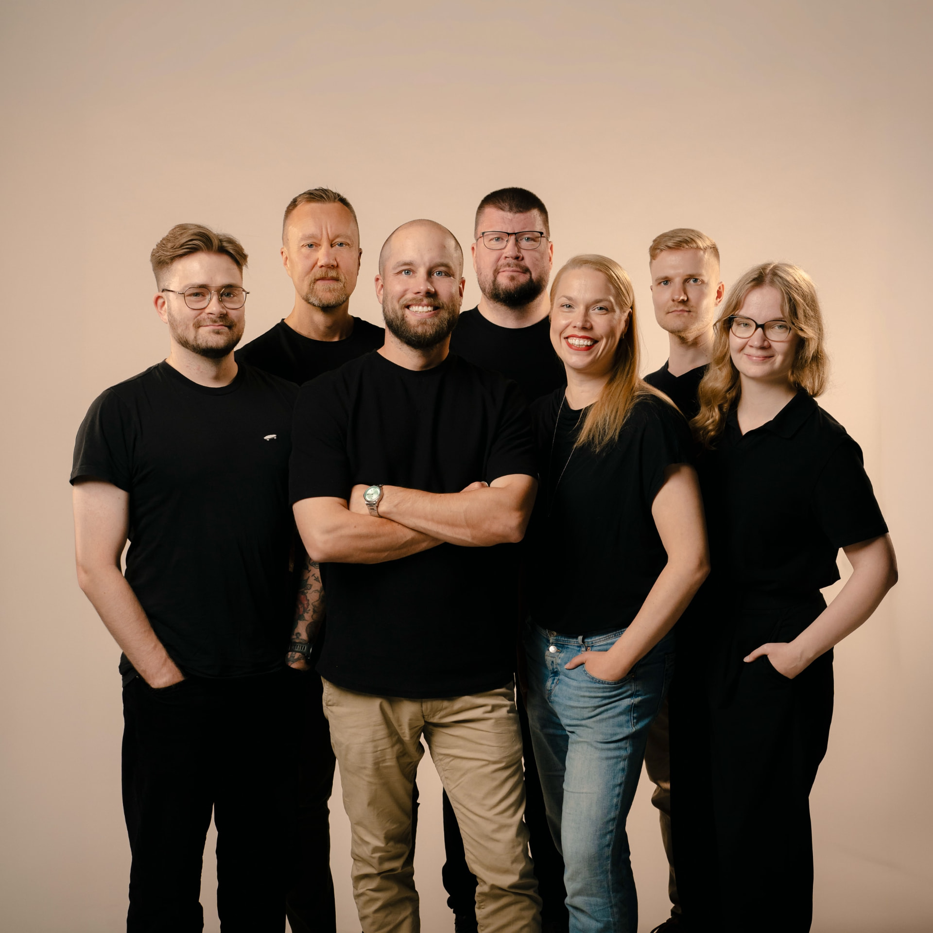 The Ounas Health team standing together in black shirts